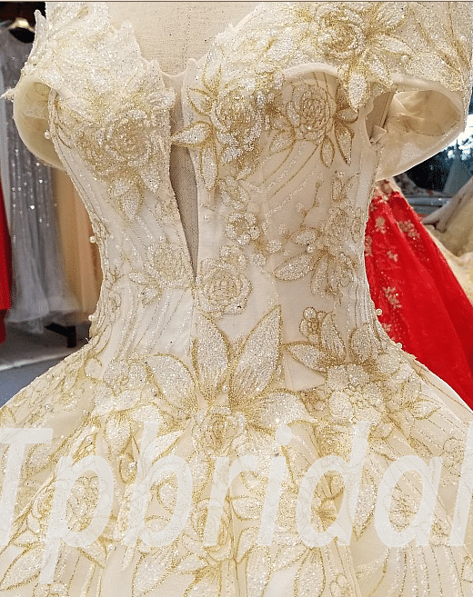 gold and white bridal dress