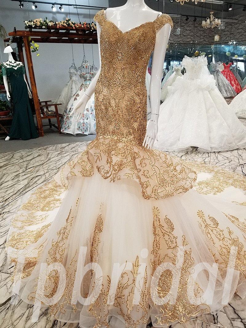 gold mermaid wedding gown