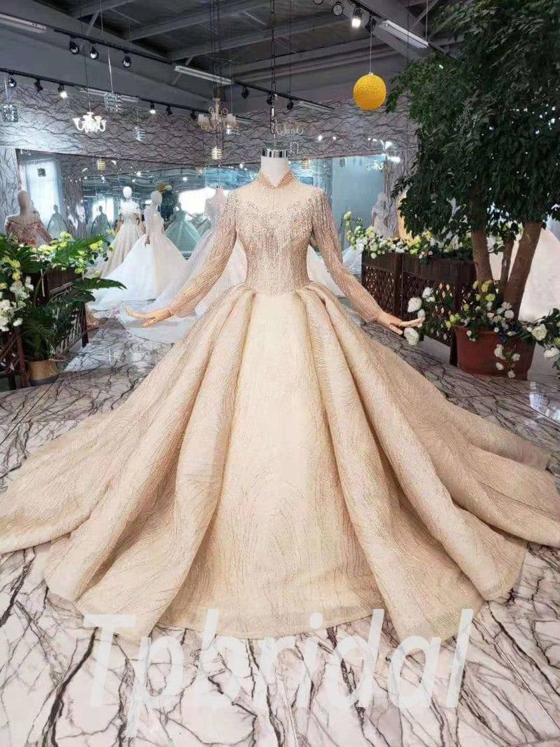 gold ball gown with sleeves