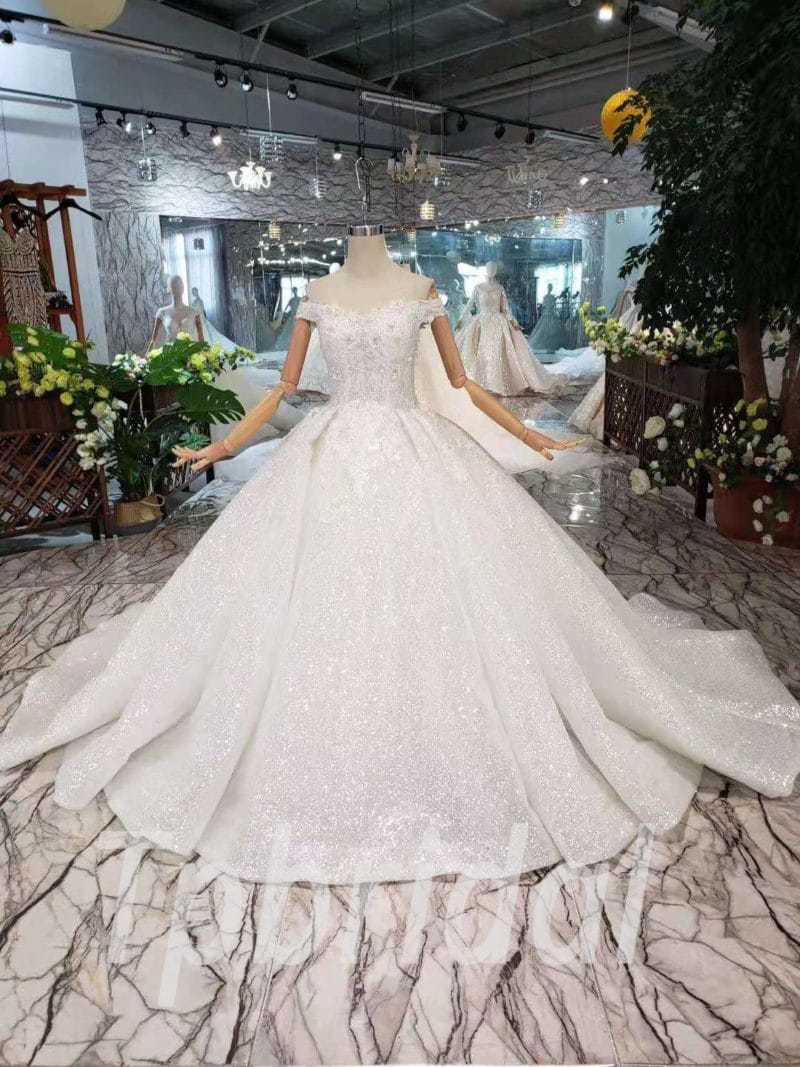 off the shoulder sparkly wedding dress