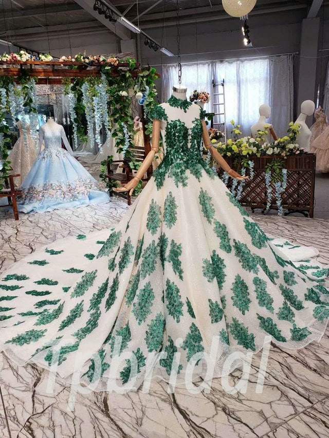 Forest fairy wedding dress in emerald green with detachable train • Offbeat  Wed (was Offbeat Bride)