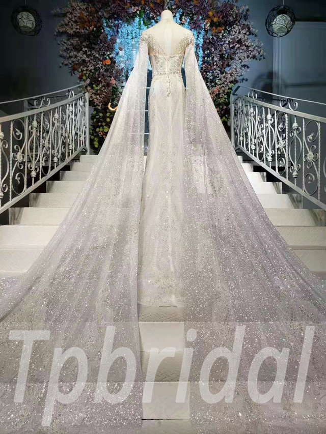 bridal gown with cape