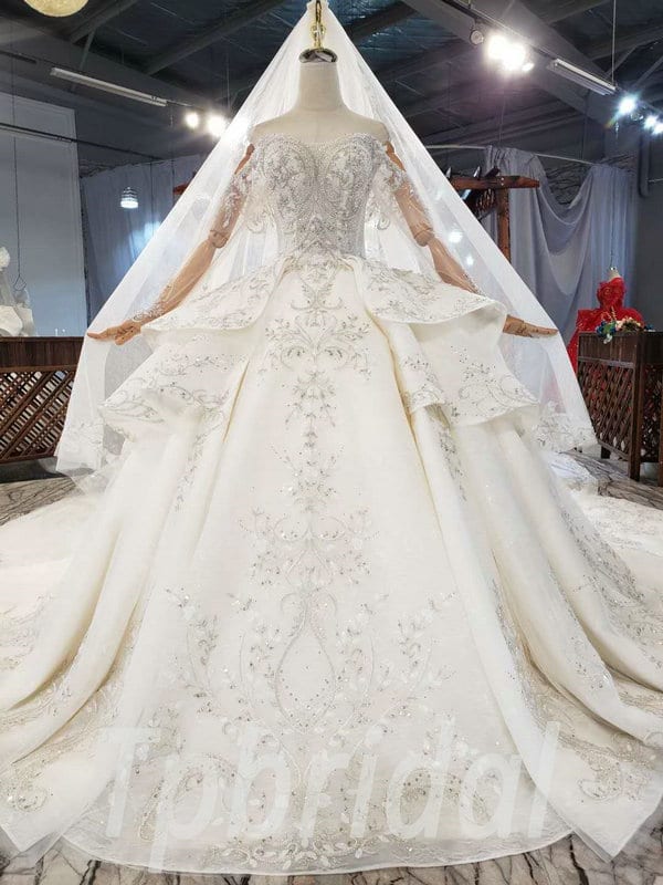 Off Shoulder Long Sleeve Wedding Dress Crystal Beaded With Veil